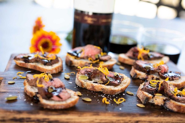 Beef Crostini with Orange Zest and Toasted Pumpkin Seeds