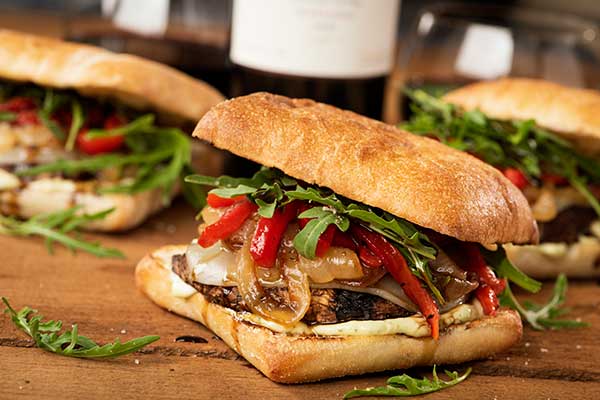 Grilled Portobello Sandwich with Caramelized Onions, Pesto Mayo and Balsamic Glaze