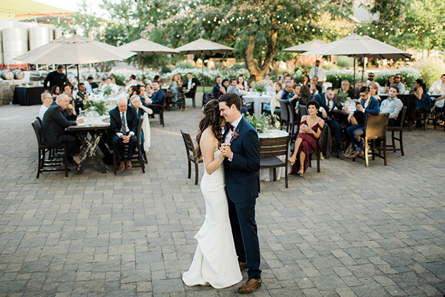 Winemaker’s Plaza Venue: Couple dancing in front of wedding guests