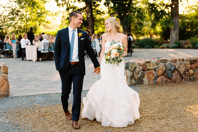 Winemaker’s Plaza Venue: Couple walking towards wedding guests