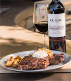 Grilled Rib Eye Steaks with Caramelized Onions and Blue Cheese